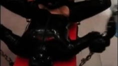 Fucking Latex Slave With A Strapon