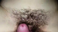 Pumping a load into my girl's hairy cunt